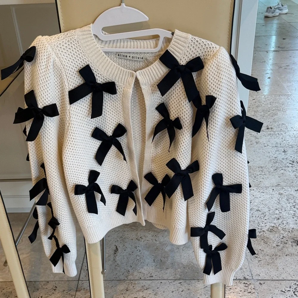 Alice + Olivia Cream Sweater with Black Bows - Picture 1 of 3